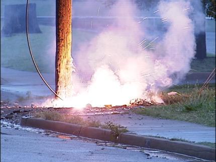 Photo of downed power line on fire